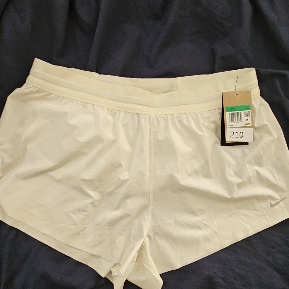 Nike Women's Light Cream Athletic Shorts